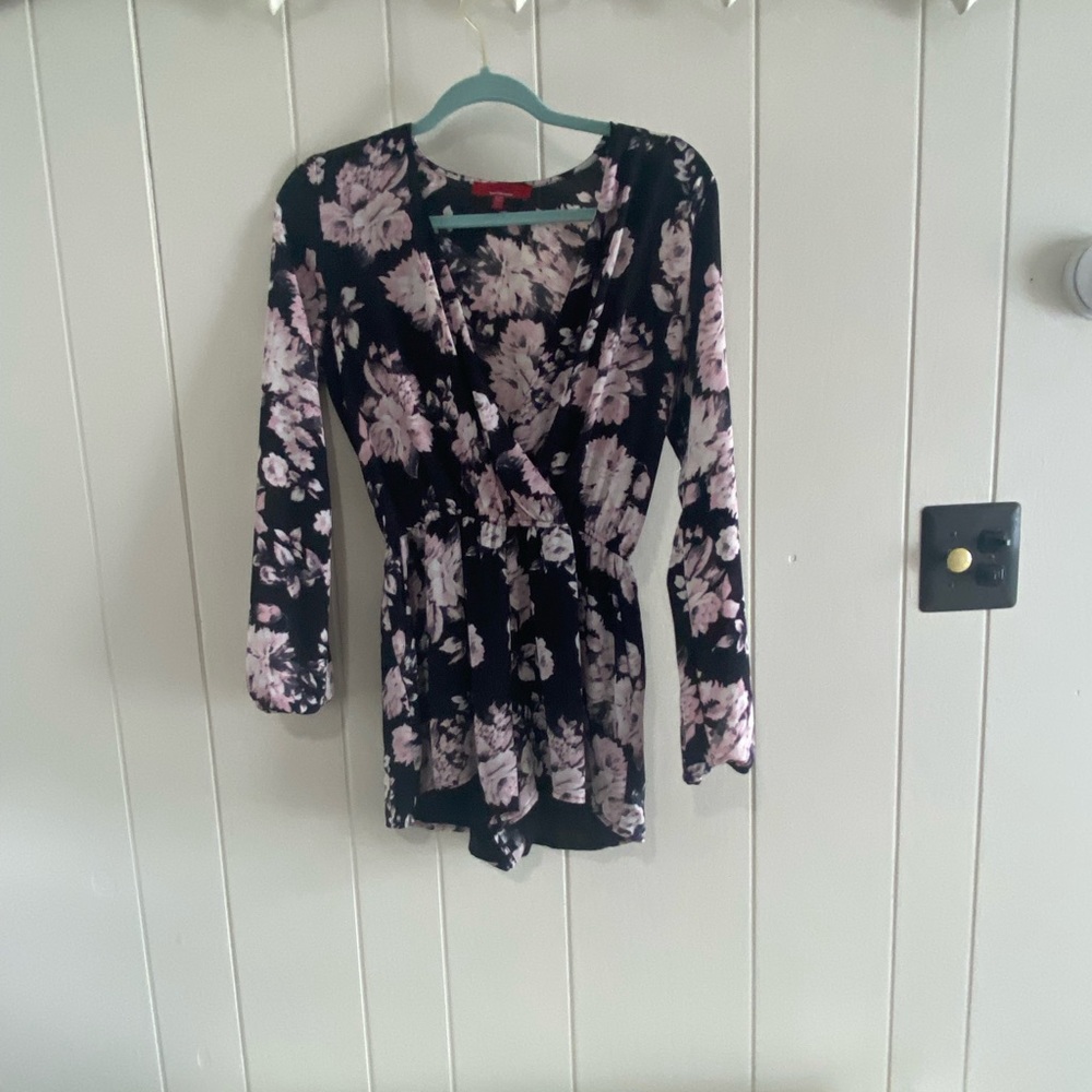 Black Romper with pink flowers. From Sax off 5th. Worn twice